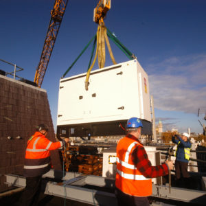 Cheval Generator being lifted onto roof of Harrington Court